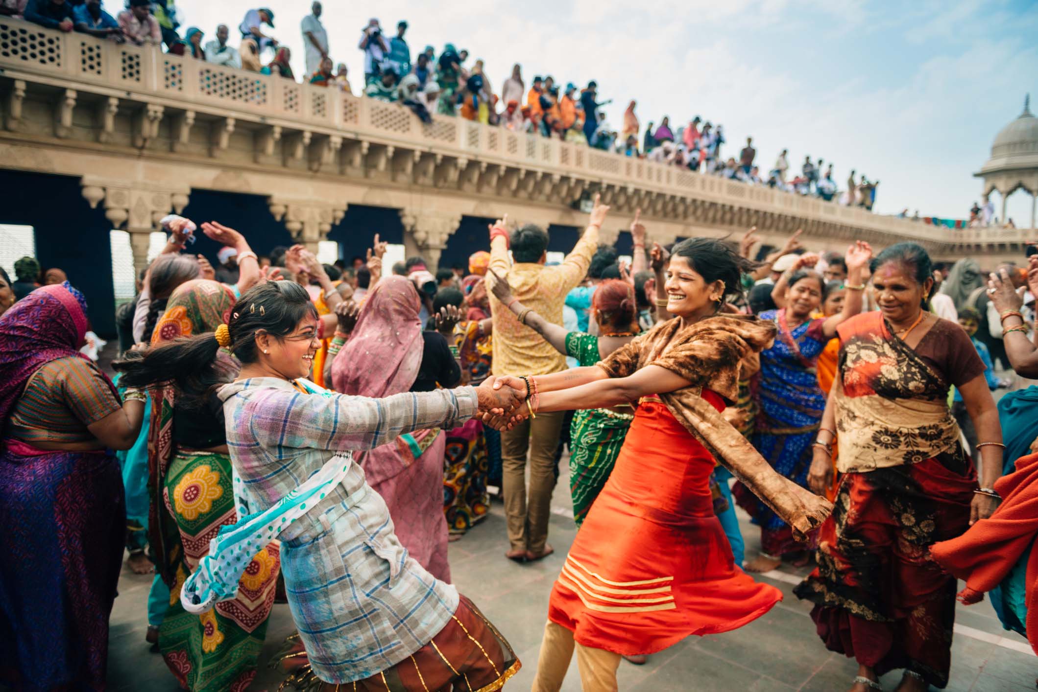 People dancing and celebrating holi in India.